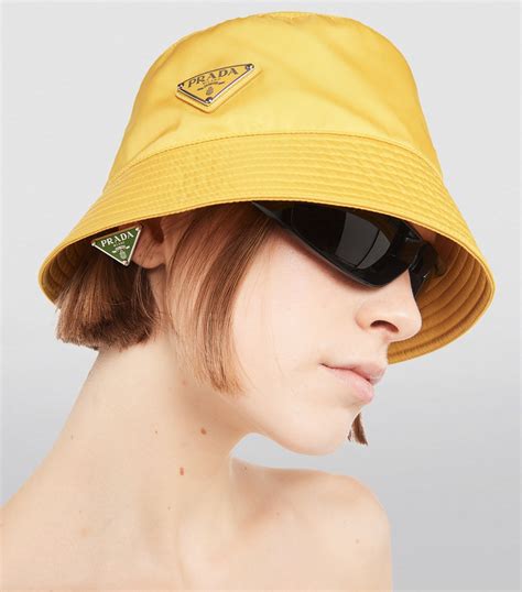 cream prada bucket hat|prada re nylon bucket hat.